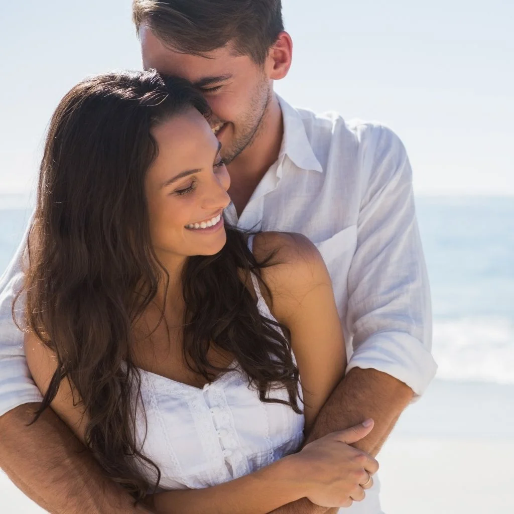 a couple embracing one another