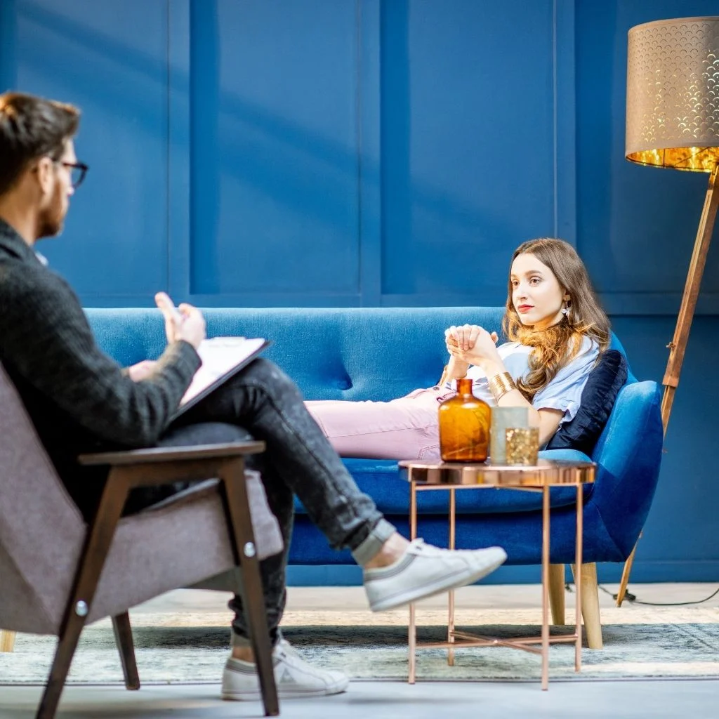 A woman receiving psychotherapy.
