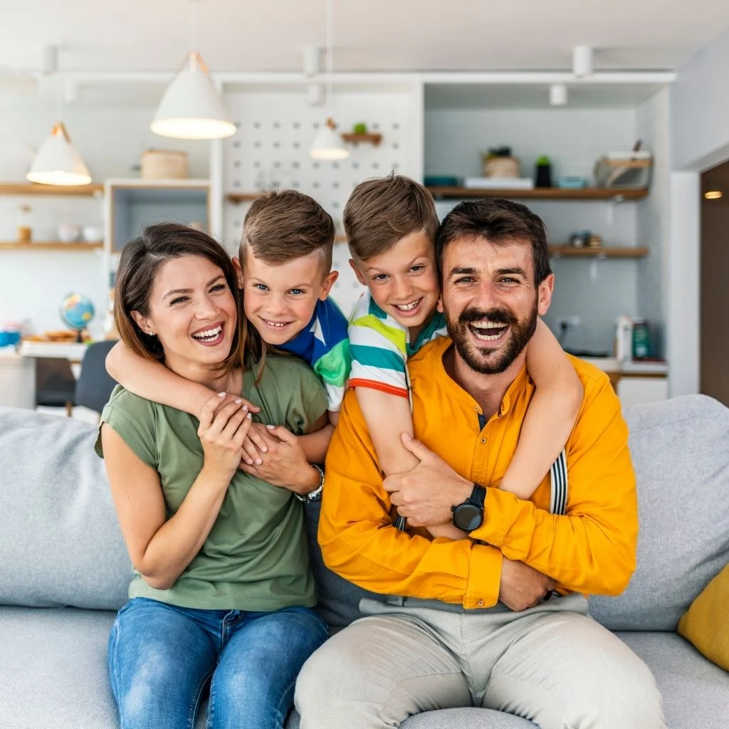 A family feeling more loving and connected after family therapy.