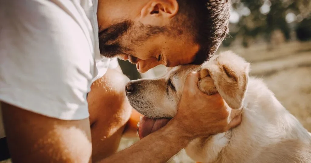 A man connecting with his emotional support animal.