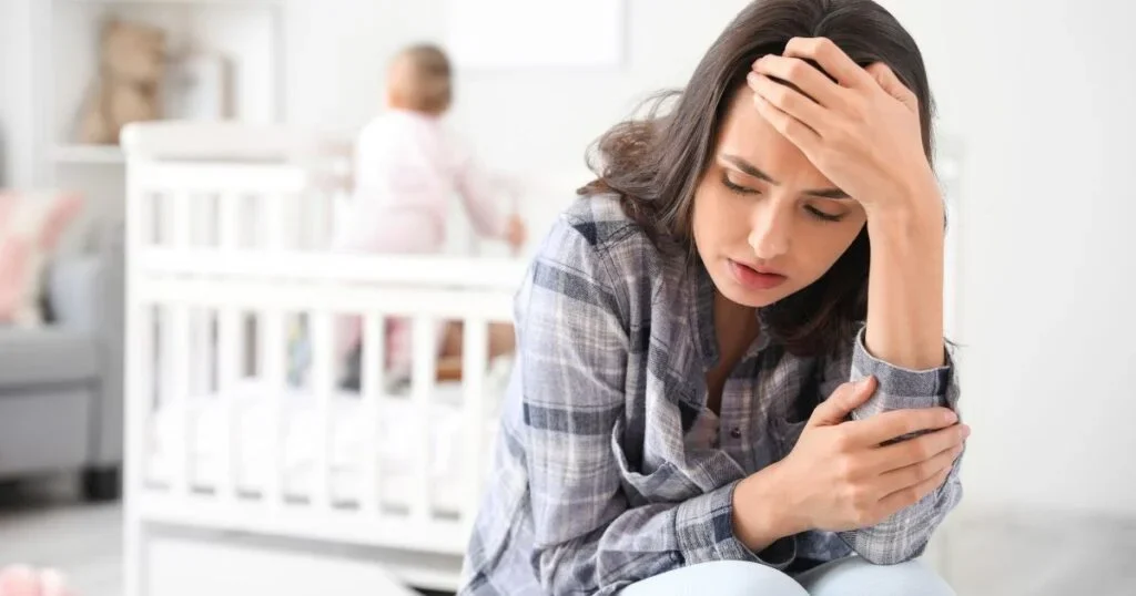 A mother struggling with depression months after giving birth.