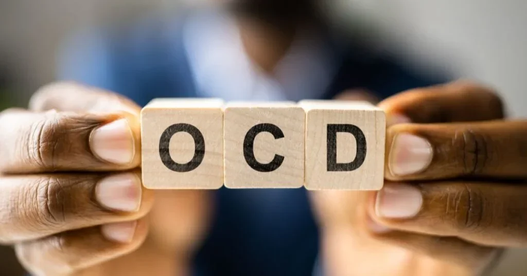 Lettered blocks spelling OCD for obsessive compulsive disorder.