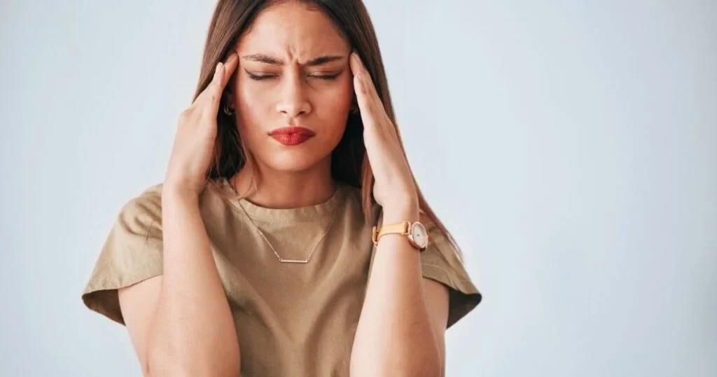 A woman struggling with the pressures of life which has brought anxious distress.