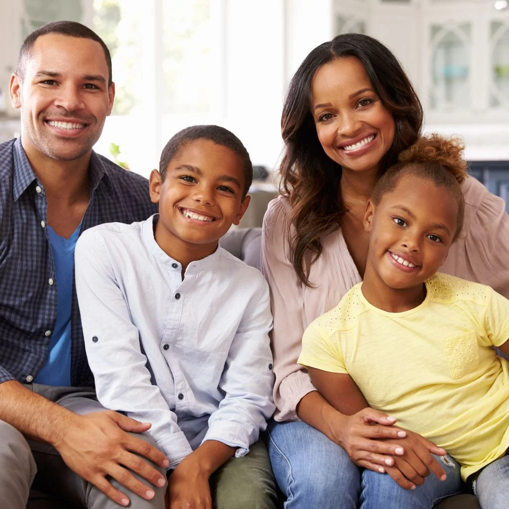 Parents Smiling With Their Children