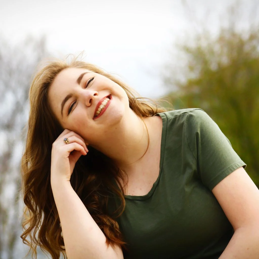 Smiling Neurodivergent Individual