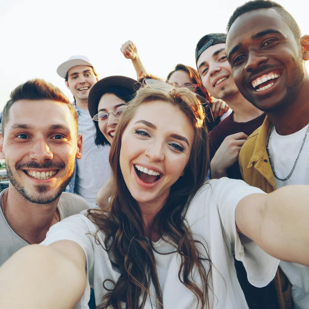 Group of smiling individuals who understand anxiety