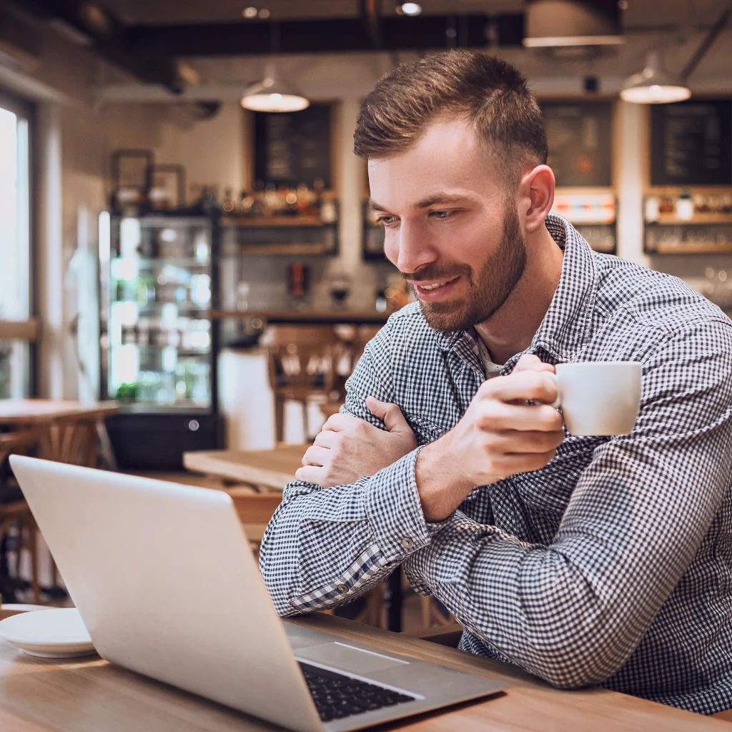 Man Reading A Blog About Mental Health Counseling